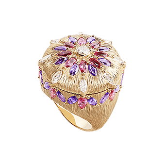 Anillo de lujo de oro rosa y diamantes con espinelas rojas
